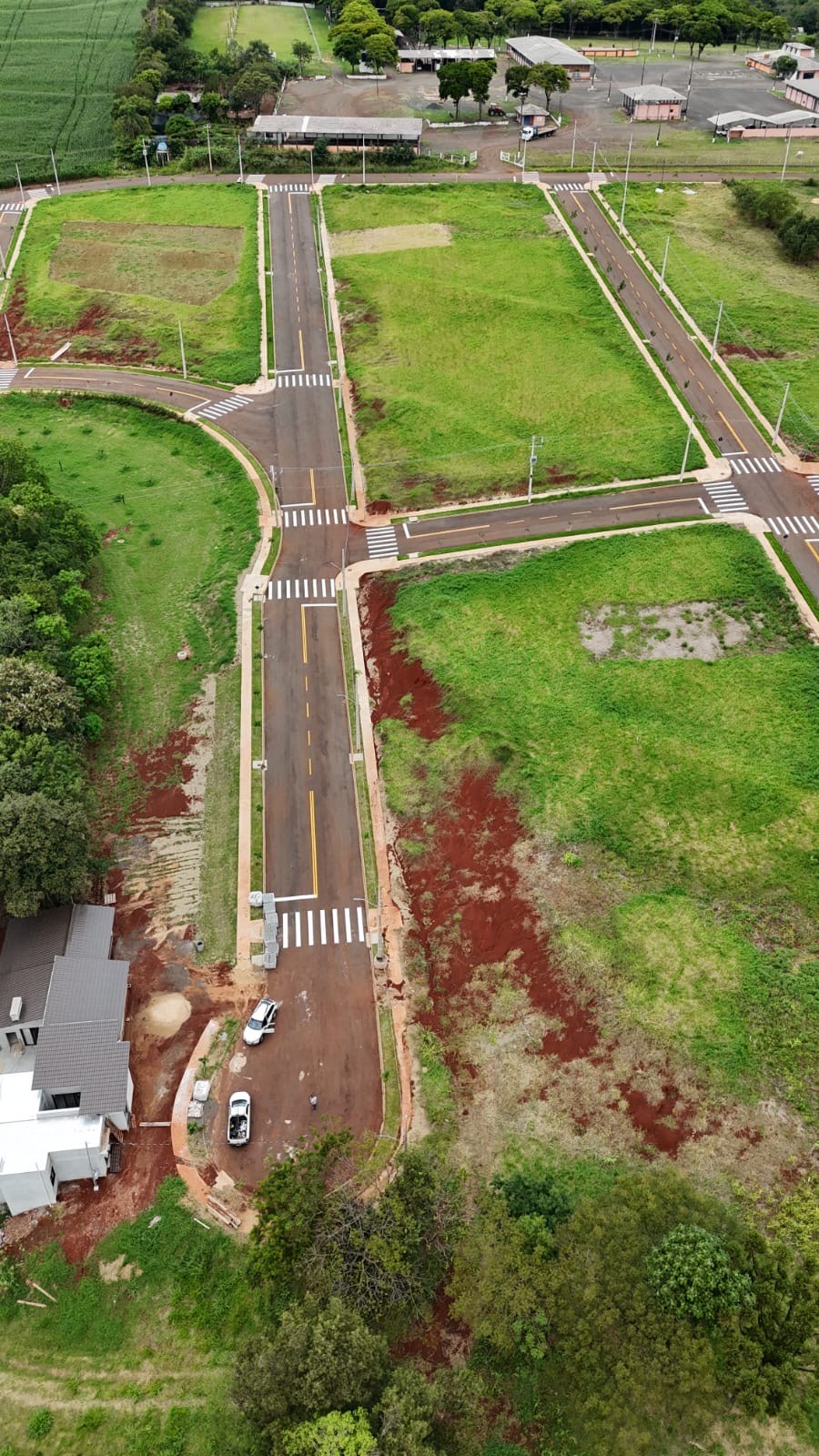 Ruas pavimentadas e lotes do Villa Verde vistos de cima